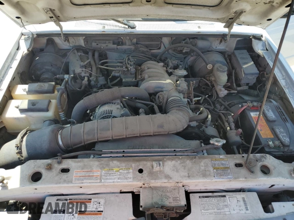 1997 Ford Ranger XL z VIN 1FTCR10U9VUB29897, wystawiony jako Copart lot #49851925 z przebiegiem 186 049 mil mil oraz Czysty tytuł • Clean title. Historia ofert i sprzedaży dostępna na DreamBid. Obrazek 11.