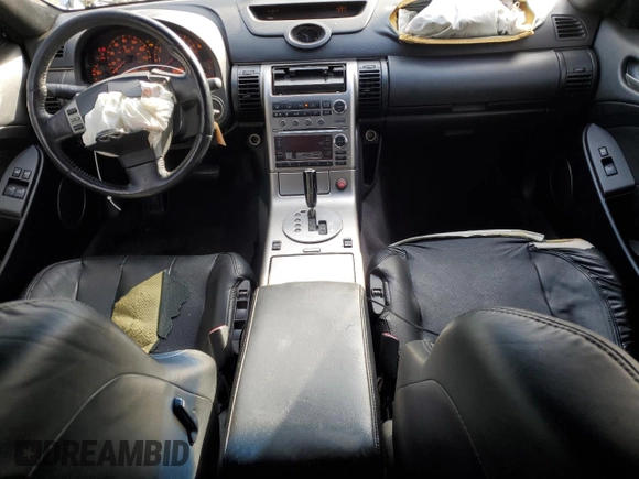 2004 Infiniti G35 w/Leather with VIN JNKCV54EX4M813182, listed as a Copart auction lot 51270445 with 139,124 mi miles and Salvage Title. Bid and sale history available at DreamBid. Image 8.