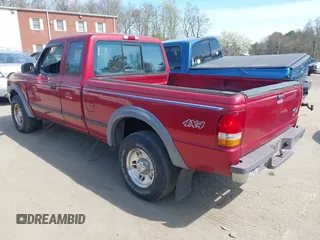 1997 Ford Ranger XLT with VIN 1FTCR15XXVTA14735, listed as a IAAI auction lot 42113672 with 114,939 mi miles. Bid and sale history available at carsss.com. Image 3.