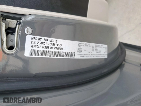 2023 Chrysler Pacifica Hybrid Touring L with VIN 2C4RC1L72PR614075, listed as a Copart auction lot 58586115 with 43,960 mi miles and Salvage title. Bid and sale history available at DreamBid. Image 12.
