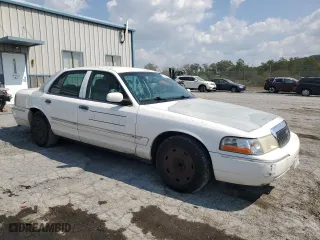 2004 Mercury Grand Marquis GS with VIN 2MEFM74W34X623107, listed as a Copart auction lot 72426544 with 198,850 mi miles and Salvage Title. Bid and sale history available at carsss.com. Image 4.