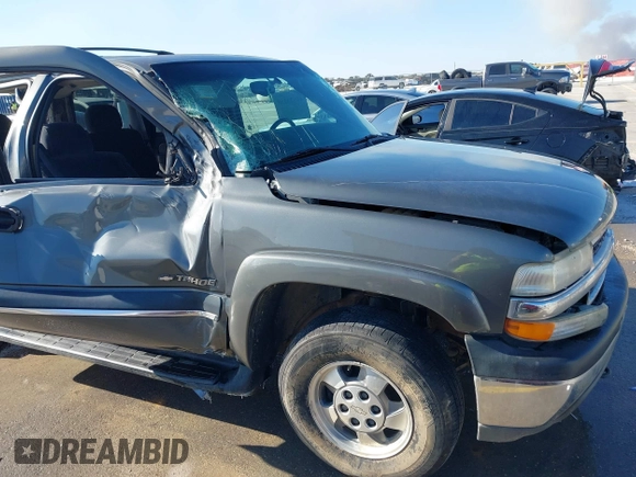 2002 Chevrolet Tahoe LT z VIN 1GNEC13Z42R319646, wystawiony jako IAAI lot #41623259 z przebiegiem 250 430 mil mil oraz . Historia ofert i sprzedaży dostępna na DreamBid. Obrazek 21.