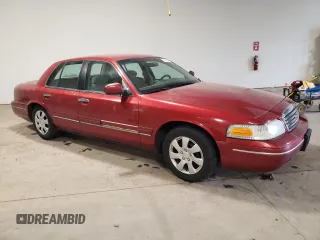 1999 Ford Crown Victoria z VIN 2FAFP73W3XX114736, wystawiony jako Copart lot #68501254 z przebiegiem 137 334 mil mil oraz Szkoda całkowita • Salvage title. Historia ofert i sprzedaży dostępna na DreamBid. Obrazek 4.