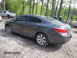 2012 Buick LaCrosse Premium 3 z VIN 1G4GH5E31CF310937, wystawiony jako IAAI lot #42092530 z przebiegiem 165 295 mil mil oraz . Historia ofert i sprzedaży dostępna na DreamBid. Obrazek 3.