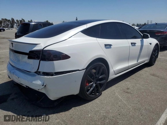 2020 Tesla Model S Performance with VIN 5YJSA1E42LF401157, listed as a Copart auction lot 55082875 with 60,376 mi miles and Salvage title. Bid and sale history available at DreamBid. Image 3.