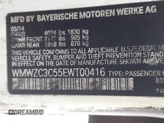 2014 MINI Countryman S with VIN WMWZC3C55EWT00416, listed as a IAAI auction lot 42031870 with Not Provided miles and . Bid and sale history available at DreamBid. Image 9.