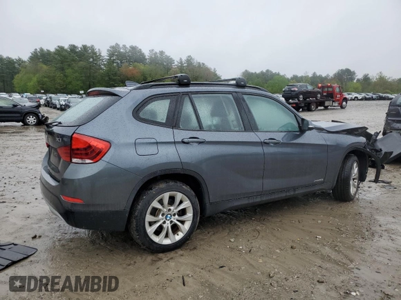 2014 BMW X1 xDrive28i z VIN WBAVL1C5XEVY22872, wystawiony jako Copart lot #54170135 z przebiegiem 93 214 mil mil oraz Czysty tytuł • Clean title. Historia ofert i sprzedaży dostępna na DreamBid. Obrazek 3.