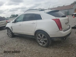 2012 Cadillac SRX Performance Collection z VIN 3GYFNBE32CS615988, wystawiony jako Copart lot #61198415 z przebiegiem 156 135 mil mil oraz Szkoda całkowita • Salvage title. Historia ofert i sprzedaży dostępna na DreamBid. Obrazek 2.