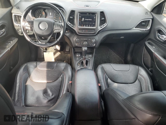 2019 Jeep Cherokee Trailhawk z VIN 1C4PJMBXXKD471338, wystawiony jako Copart lot #59880765 z przebiegiem 59 546 mil mil oraz Szkoda całkowita • Salvage title. Historia ofert i sprzedaży dostępna na DreamBid. Obrazek 8.