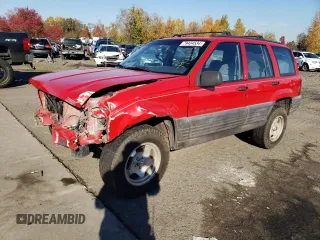 1998 Jeep Grand Cherokee Laredo with VIN 1J4GZ58S3WC245142, listed as a Copart auction lot 79434534 with 276,971 mi miles and Salvage Title. Bid and sale history available at carsss.com. Image 1.