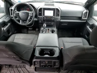 2019 Ford F-150 XL with VIN 1FTEW1E5XKFD24698, listed as a Copart auction lot 60204085 with 145,406 mi miles and Salvage title. Bid and sale history available at DreamBid. Image 8.