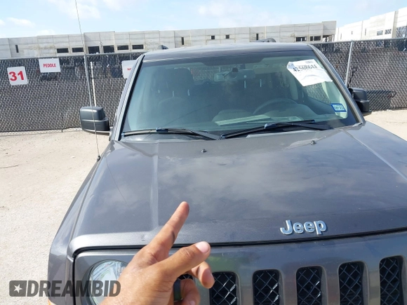 2015 Jeep Patriot Sport with VIN 1C4NJRBB7FD257941, listed as a IAAI auction lot 42568644 with 94,177 mi miles and . Bid and sale history available at DreamBid. Image 6.