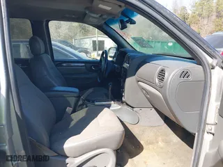 2004 GMC Envoy XUV SLT with VIN 1GKET12S346176162, listed as a IAAI auction lot 41787354 with 237,205 mi miles. Bid and sale history available at carsss.com. Image 5.