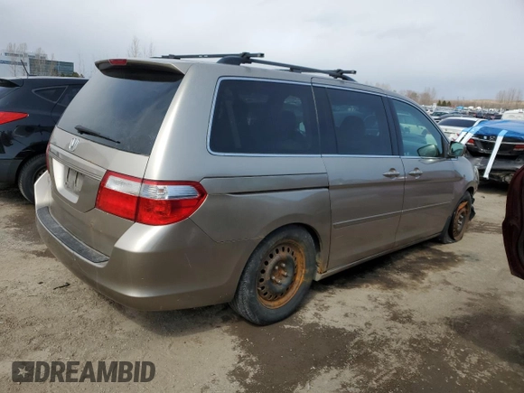 2007 Honda Odyssey EX-L with VIN 5FNRL38627B513688, listed as a Copart auction lot 52483475 with 321,974 mi miles and Clean Title. Bid and sale history available at carsss.com. Image 3.