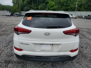 2016 Hyundai Tucson SE z VIN KM8J33A47GU167064, wystawiony jako Copart lot #56566545 z przebiegiem 101 703 mil mil oraz Szkoda całkowita • Salvage title. Historia ofert i sprzedaży dostępna na DreamBid. Obrazek 6.