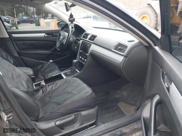 2012 Volkswagen Passat SE with VIN 1VWBP7A30CC026507, listed as a IAAI auction lot 42042850 with 202,406 mi miles. Bid and sale history available at carsss.com. Image 5.