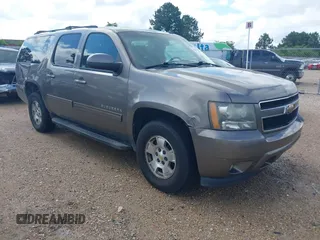 2011 Chevrolet Suburban LT z VIN 1GNSKJE37BR337895, wystawiony jako IAAI lot #42171238 z przebiegiem 228 327 mil mil oraz . Historia ofert i sprzedaży dostępna na DreamBid. Obrazek 1.