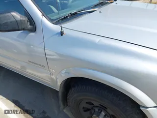 1998 Isuzu Rodeo S with VIN 4S2CM58WXW4325350, listed as a IAAI auction lot 42084411 with 292,784 mi miles. Bid and sale history available at carsss.com. Image 12.
