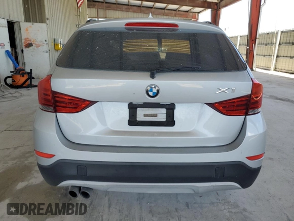2014 BMW X1 sDrive28i z VIN WBAVM1C57EVW50653, wystawiony jako Copart lot #57309385 z przebiegiem Nie podano mil oraz Szkoda całkowita • Salvage title. Historia ofert i sprzedaży dostępna na DreamBid. Obrazek 6.