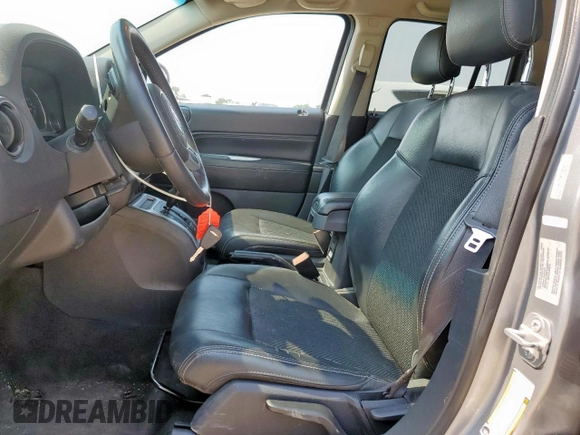 2017 Jeep Compass High Altitude with VIN 1C4NJCEB4HD198794, listed as a Copart auction lot 56976745 with 183,196 mi miles and Salvage title. Bid and sale history available at DreamBid. Image 7.