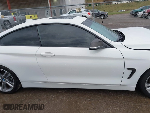 2014 BMW 4 Series 428i with VIN WBA3N3C58EF712202, listed as a IAAI auction lot 41843517 with 90,958 mi miles and . Bid and sale history available at DreamBid. Image 14.