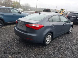 2016 Kia Forte LX with VIN KNAFK4A69G5560835, listed as a IAAI auction lot 42003212 with 100,873 mi miles. Bid and sale history available at carsss.com. Image 4.