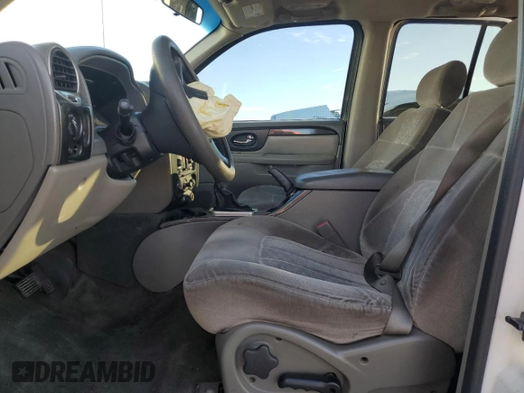 2003 GMC Envoy SLT with VIN 1GKDT13S232405530, listed as a Copart auction lot 45555865 with 138,680 mi miles and Salvage Title. Bid and sale history available at carsss.com. Image 7.