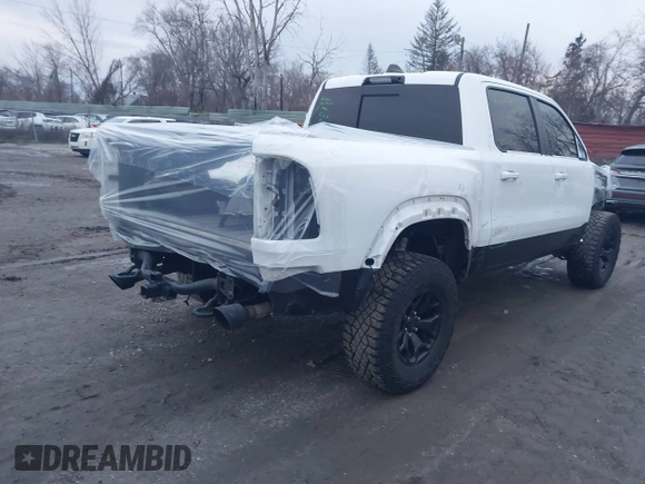 2021 Ram 1500 TRX with VIN 1C6SRFU90MN763114, listed as a IAAI auction lot 41201579 with 69,984 mi miles. Bid and sale history available at carsss.com. Image 4.