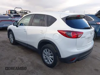 2014 Mazda CX-5 Touring with VIN JM3KE2CY8E0321578, listed as a IAAI auction lot 41769930 with 101,724 mi miles. Bid and sale history available at carsss.com. Image 3.
