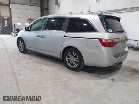 2012 Honda Odyssey EX z VIN 5FNRL5H47CB045705, wystawiony jako IAAI lot #42384430 z przebiegiem 157 598 mil mil oraz . Historia ofert i sprzedaży dostępna na DreamBid. Obrazek 3.
