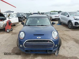 2017 MINI Hardtop 4 Door Cooper S z VIN WMWXU3C3XH2F49313, wystawiony jako IAAI lot #42137594 z przebiegiem 87 865 mil mil oraz . Historia ofert i sprzedaży dostępna na DreamBid. Obrazek 11.