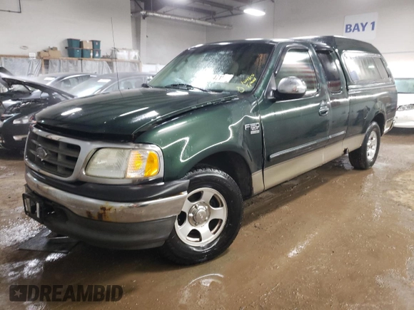 2002 Ford F-150 XL with VIN 1FTRX17L22NB97610, listed as a Copart auction lot 47186355 with 70,767 mi miles and Salvage title. Bid and sale history available at DreamBid. Image 1.