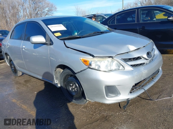 2011 Toyota Corolla L with VIN JTDBU4EE8B9167374, listed as a IAAI auction lot 41312318 with 189,903 mi miles. Bid and sale history available at carsss.com. Image 1.