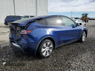 2024 Tesla Model Y Long Range с VIN 7SAYGDEE5RF983771, выставлен на аукционе Copart как лот 86153274 с пробегом 4 105 миль миль и Списание • Salvage title. История ставок и продаж доступна на DreamBid. Изображение 3.