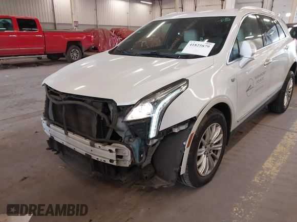 2017 Cadillac XT5 FWD with VIN 1GYKNARS7HZ121596, listed as a IAAI auction lot 41825879 with 82,023 mi miles and . Bid and sale history available at DreamBid. Image 20.