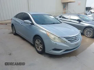 2013 Hyundai Sonata GLS z VIN 5NPEB4AC0DH765752, wystawiony jako IAAI lot #42242759 z przebiegiem 169 408 mil mil oraz . Historia ofert i sprzedaży dostępna na DreamBid. Obrazek 1.