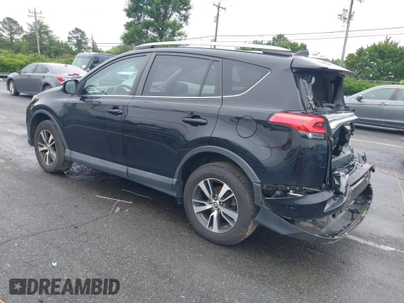 2018 Toyota RAV4 XLE with VIN 2T3WFREVXJW501296, listed as a IAAI auction lot 42358130 with 163,669 mi miles and . Bid and sale history available at DreamBid. Image 3.