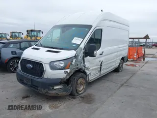 2021 Ford Transit Cargo with VIN 1FTBR1X82MKA98734, listed as a IAAI auction lot 41424123 with 84,453 mi miles and . Bid and sale history available at DreamBid. Image 2.