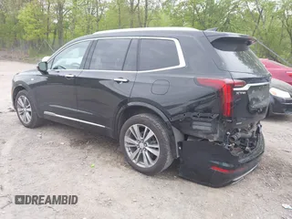2022 Cadillac XT6 Premium Luxury with VIN 1GYKPDRS5NZ149971, listed as a IAAI auction lot 42259140 with 51,704 mi miles and . Bid and sale history available at DreamBid. Image 3.