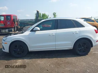 2017 Audi Q3 Premium z VIN WA1ECCFS7HR009402, wystawiony jako IAAI lot #42462248 z przebiegiem 46 536 mil mil oraz . Historia ofert i sprzedaży dostępna na DreamBid. Obrazek 14.