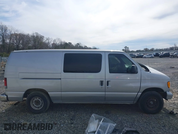 1998 Ford Econoline Cargo with VIN 1FTRE1428WHB30628, listed as a IAAI auction lot 41706164 with 153,223 mi miles. Bid and sale history available at carsss.com. Image 13.