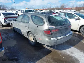 2004 Mercury Sable LS Premium with VIN 1MEFM59S64A608491, listed as a IAAI auction lot 41599768 with 183,667 mi miles. Bid and sale history available at carsss.com. Image 3.