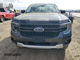 2024 Ford Ranger XLT with VIN 1FTER4GHXRLE33755, listed as a Copart auction lot 42812135 with 1,012 mi miles and Salvage Title. Bid and sale history available at carsss.com. Image 5.