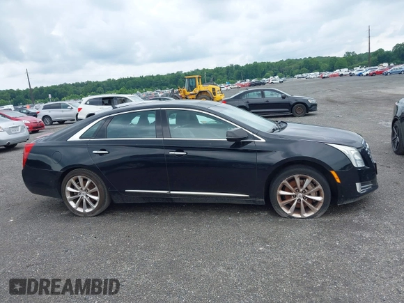 2013 Cadillac XTS Luxury z VIN 2G61P5S34D9183065, wystawiony jako IAAI lot #42665741 z przebiegiem 209 585 mil mil oraz . Historia ofert i sprzedaży dostępna na DreamBid. Obrazek 14.