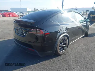 2023 Tesla Model X with VIN 7SAXCDE59PF430836, listed as a IAAI auction lot 41545267 with Not Provided miles and . Bid and sale history available at DreamBid. Image 4.