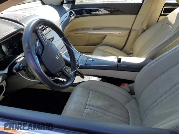 2015 Lincoln MKZ z VIN 3LN6L2JK1FR604092, wystawiony jako Copart lot #48379525 z przebiegiem 64 656 mil mil oraz Szkoda całkowita • Salvage title. Historia ofert i sprzedaży dostępna na DreamBid. Obrazek 7.