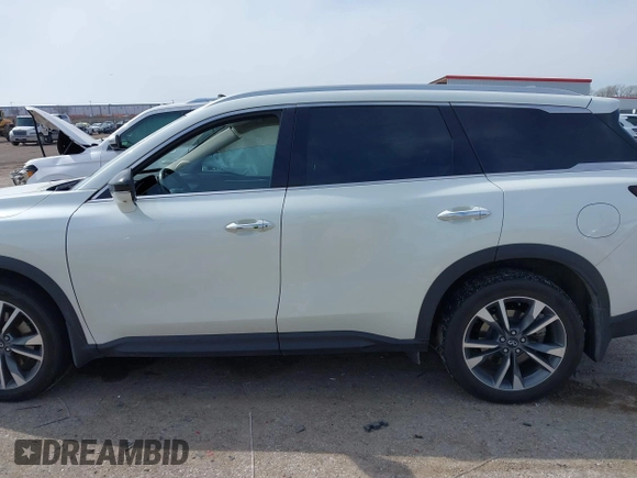 2023 Infiniti QX60 Luxe with VIN 5N1DL1FS8PC371340, listed as a IAAI auction lot 41579561 with 13,074 mi miles and . Bid and sale history available at DreamBid. Image 14.