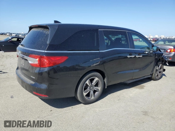 2018 Honda Odyssey Touring with VIN 5FNRL6H80JB065039, listed as a Copart auction lot 54944595 with 81,987 mi miles and Salvage Title. Bid and sale history available at carsss.com. Image 3.