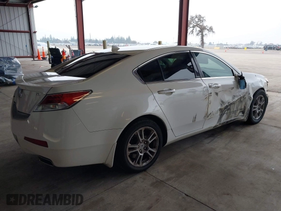 2009 Acura TL Tech with VIN 19UUA86509A008303, listed as a IAAI auction lot 41076598 with 253,434 mi miles. Bid and sale history available at carsss.com. Image 4.