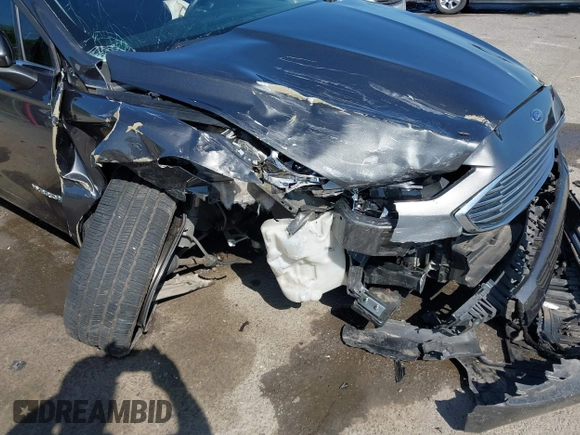 2017 Ford Fusion Hybrid SE with VIN 3FA6P0LU0HR195992, listed as a IAAI auction lot 42007452 with 78,578 mi miles and . Bid and sale history available at DreamBid. Image 6.